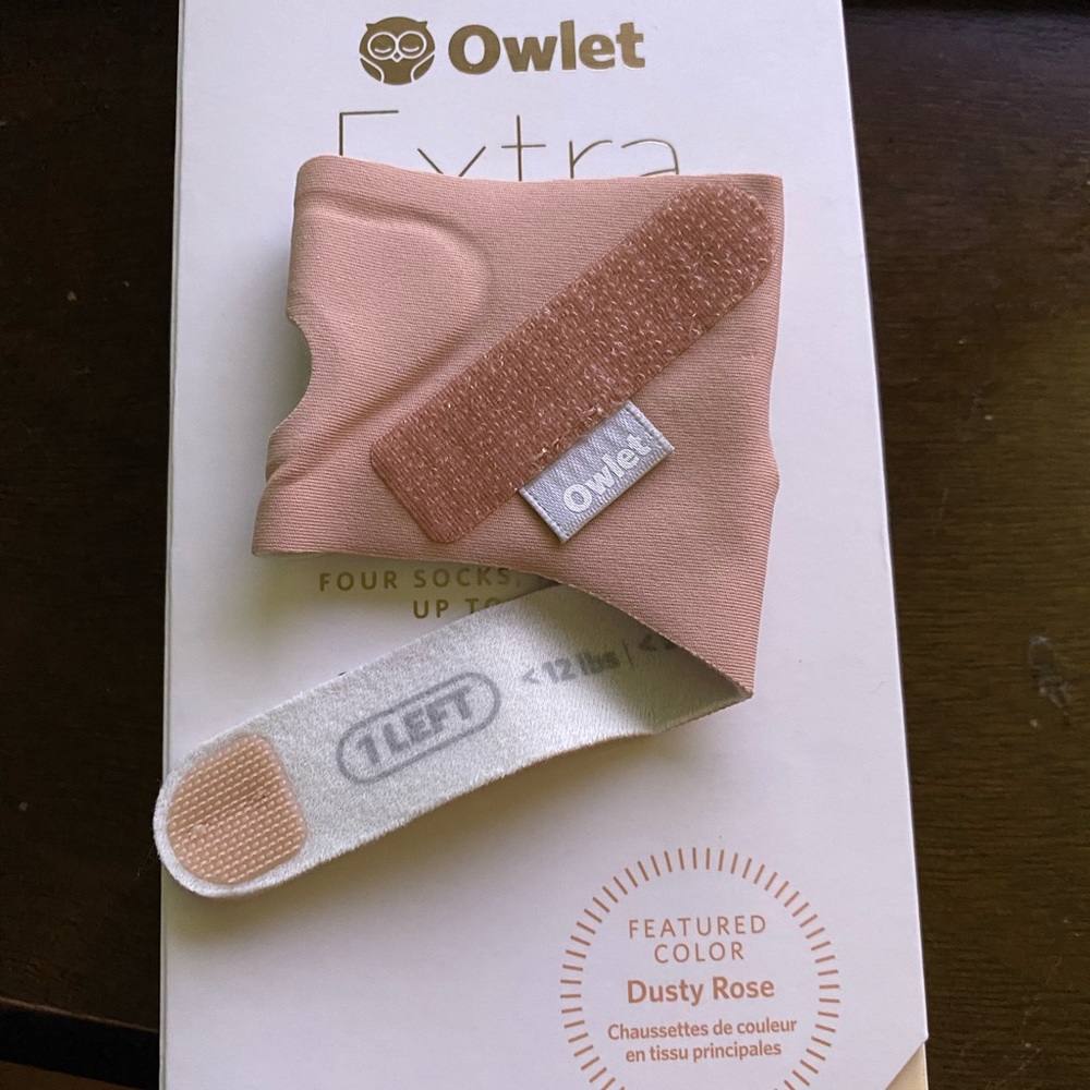 Brand new. Size 1 owlet sock. Dusty Rose colored.